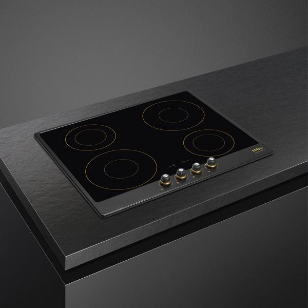 Индукционная варочная панель Smeg SI764AOM